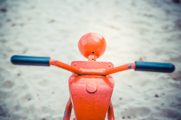 Toy motorbike in playground