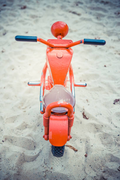 Toy motorbike in playground
