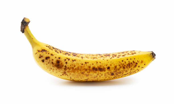 istock One banana out of a sugar pot placed on a white background 1282922519