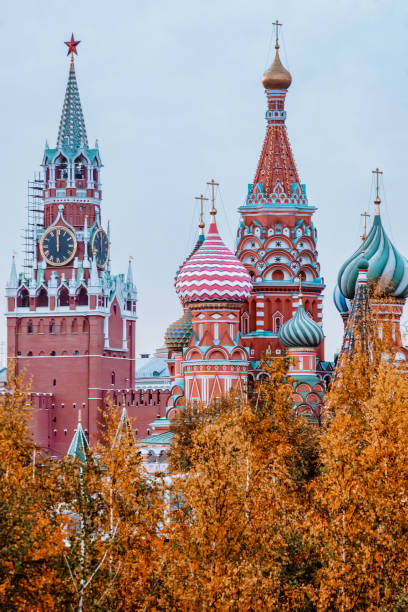 istock Moscow kremlin tower and cathedral with autumn trees 1282923242