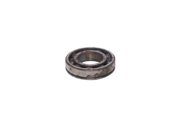 istock Old rusty bearing kit on a white background.Abandoned car part 1282927053