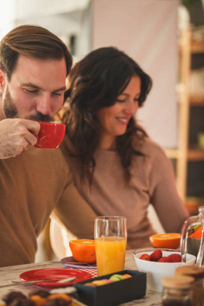 istock Couple enjoying tea or coffee with their breakfast 1282928138
