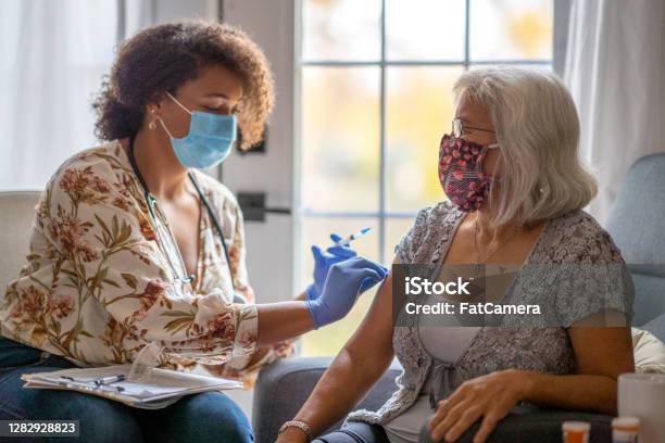 Medical Home Visit Stock Photo - Download Image Now - Doctor, Domestic Life, Vaccination