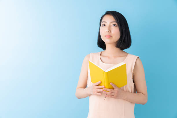 istock asian woman who reads a book 1282930546