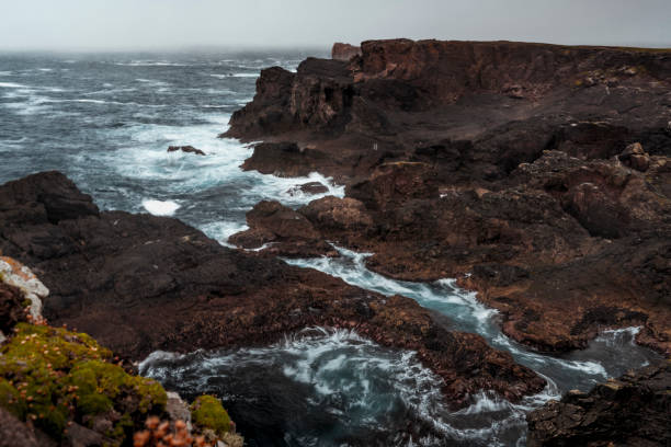 The rocky coast of Eshaness, is a peninsula on the west coast of Northmavine, on the island of Mainland, Shetland, Scotland. Long exposure photo.