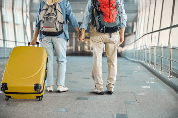 istock Senior woman and a man holding hands 1282932697