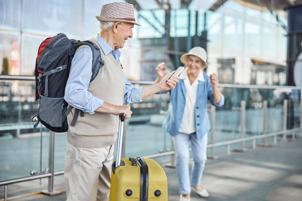 istock Concentrated senior man using his smartphone outdoors 1282932798
