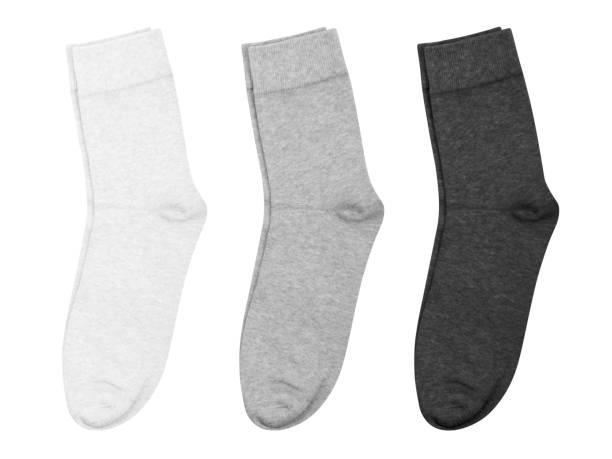 istock Set of medium length socks white, gray, black, isolated on white background 1282933859