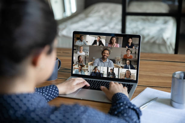 istock Woman speak on video call with diverse colleagues 1282935503