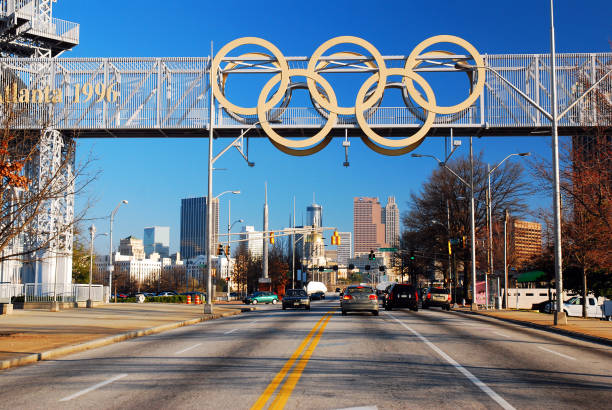 Olympic Rings over Atlanta Atlanta, GA,USA February 28 The Olympic Rings continue to hang over the Atlanta skyline, a reminder of when the city hosted the games in 1992 olympic city stock pictures, royalty-free photos & images