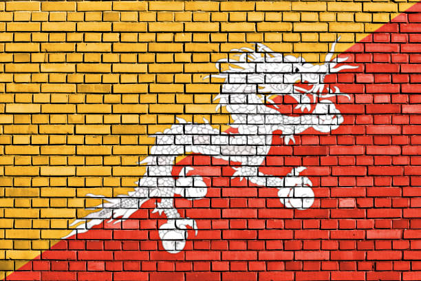 istock flag of Bhutan painted on brick wall 1282939691