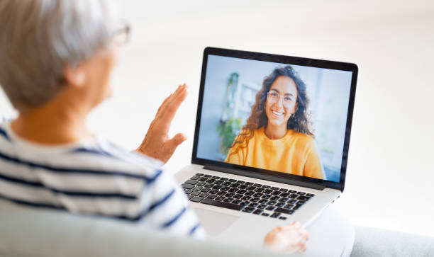 istock Senior woman is using laptop for conversation with daughter 1282950932