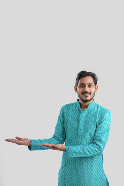 Indian man in ethnic wear and Showing Direction