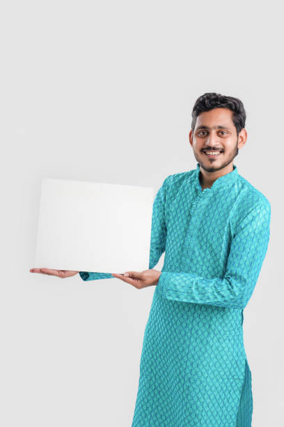 istock Indian man in ethnic wear and Showing Direction 1282951698