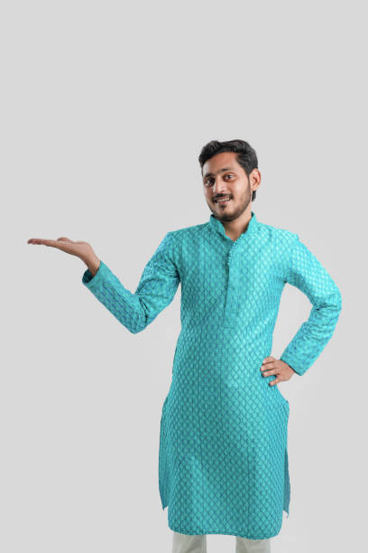 istock Indian man in ethnic wear and Showing Direction 1282951700