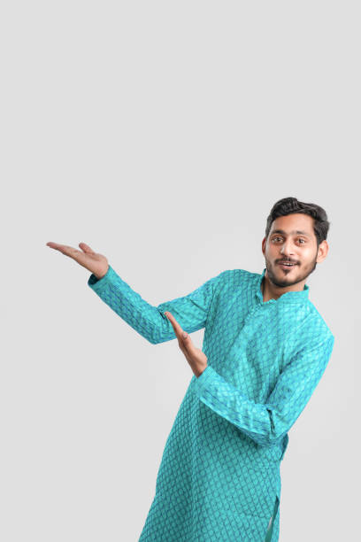 istock Indian man in ethnic wear and Showing Direction 1282951779