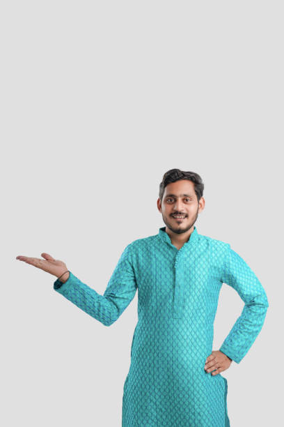istock Indian man in ethnic wear and Showing Direction 1282951851
