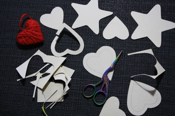 istock Make a star and heart out of cardboard and yarn. 1282954930