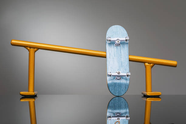 istock Fingerboard and metal painted railing for riding small skateboards 1282955139