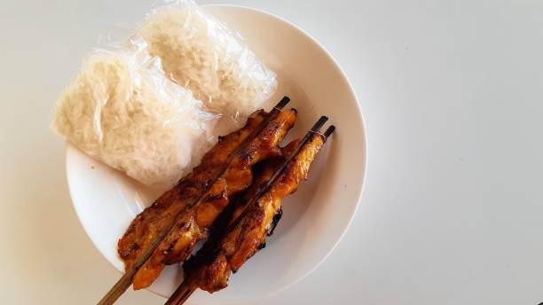 istock Sticky rice with roast chicken on white background. 1282956695