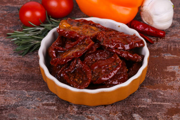 istock Dried tomatoes in the bowl with olive oil 1282957151