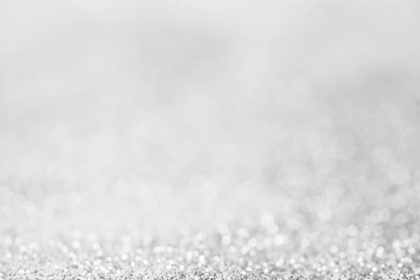 istock abstract blurred silver color bokeh background for festive decoration 1282964593