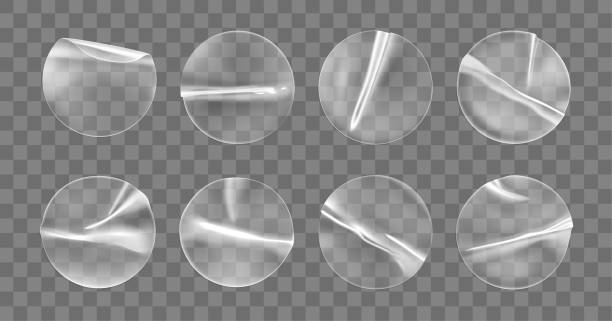 istock Transparent round adhesive stickers mock up set isolated on transparent background. Plastic crumpled round sticky label with glued effect. Template of a label or price tags. 3d realistic vector mockup 1282965934