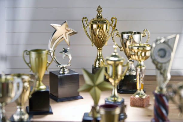 istock selective focus on one trophy with other trophies as background 1282973991