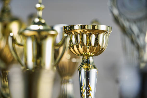 istock selective focus on one trophy with other trophies as background 1282974039