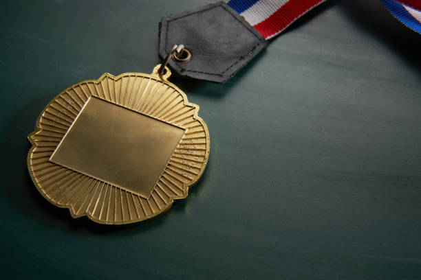 istock golden medal on green background 1282974694