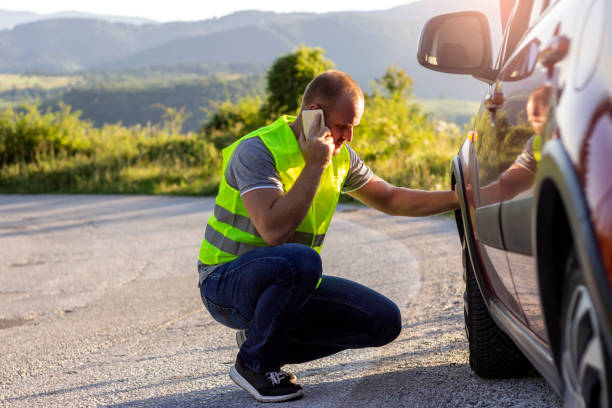 istock My tire is flat, could you help me? 1282975408