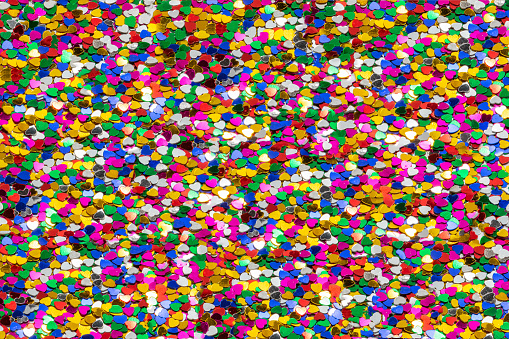 Multi-colored background made of tiny colorful hearts symbolizing love and diversity. Valentines Day Theme.