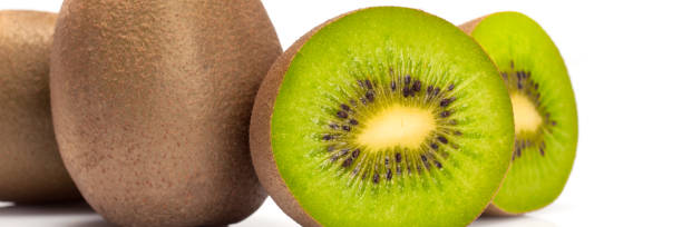 Food banner concept, organic fruits and ingredients: close up of organic kiwis stock photo