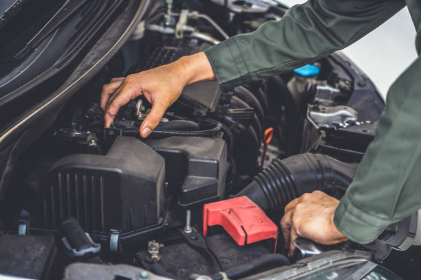 istock Professional mechanic hand providing car repair and maintenance service 1282977314