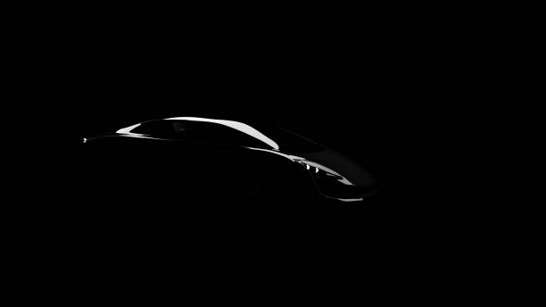 istock black sportscar silhouette on black background 1282978732