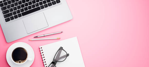 istock Top view of a pink desktop with copy space 1282980240