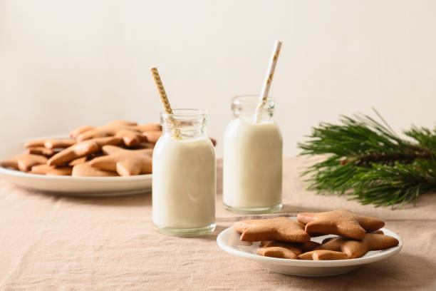 cookie with milk for santa claus. - milk milk bottle drinking straw cookie imagens e fotografias de stock