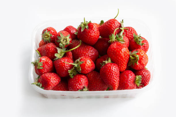 istock Box of strawberry on white background 1282983056