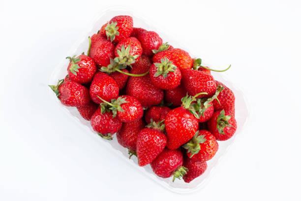 istock Box of strawberry on white background 1282983066