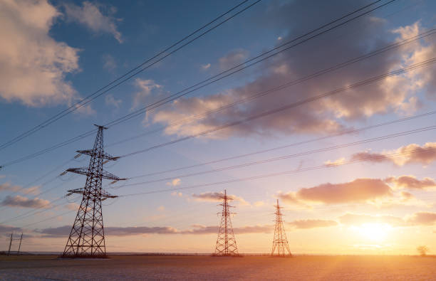 istock Power lines during a beautiful winter sunset. 1282983415
