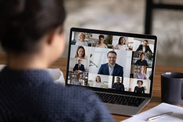 istock Female employee talk on video call with colleagues 1282984208