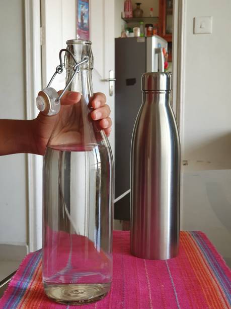 istock Glass and steel water bottles for drinking water 1282985116