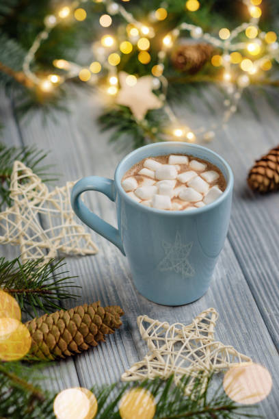 istock Cocoa mug with marshmallows among the Christmas decor. 1282986360