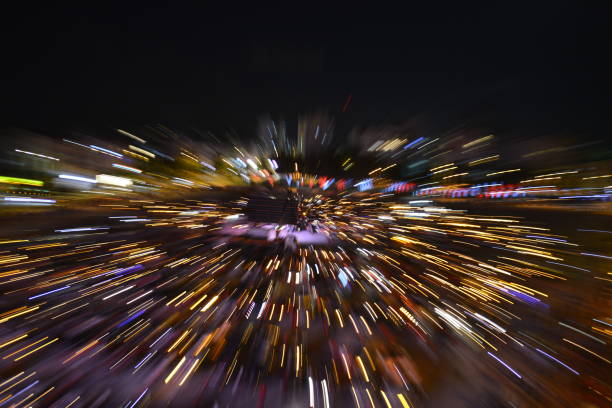 Zoom burst technique night shot. standing car lights and city view, zoom in zoom out photography technique. Zoom burst technique night shot. city zoom out stock pictures, royalty-free photos & images