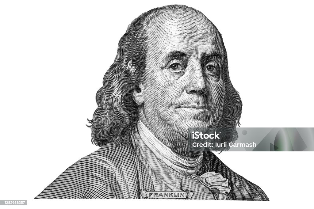 Benjamin Franklin cut from new 100 dollars banknote  on white background fragment. Money Still Life Benjamin Franklin Stock Photo