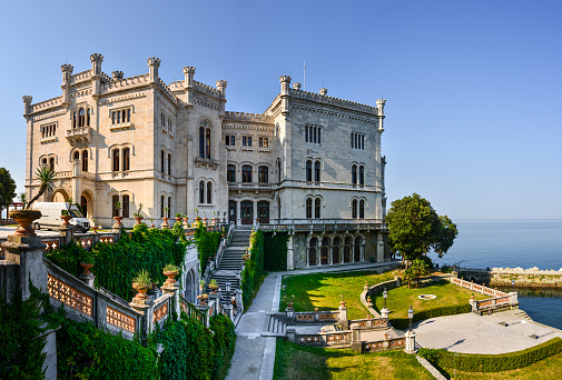 Miramare Castle, Castello di Miramare, in sunset. it is a 19th century castle on the Gulf of Trieste near Trieste, Italy. It was built for Austrian Archduke Ferdinand Maximilian