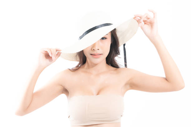 istock Woman studio portrait with sunlight. 1282990943