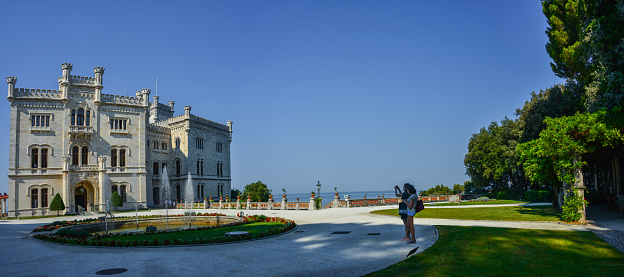 Miramare Castle, Castello di Miramare, in sunset. it is a 19th century castle on the Gulf of Trieste near Trieste, Italy. It was built for Austrian Archduke Ferdinand Maximilian