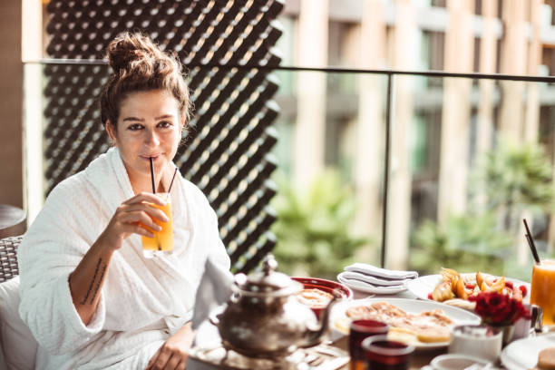 istock woman at the table for the buffet breakfast with fruit 1282991011