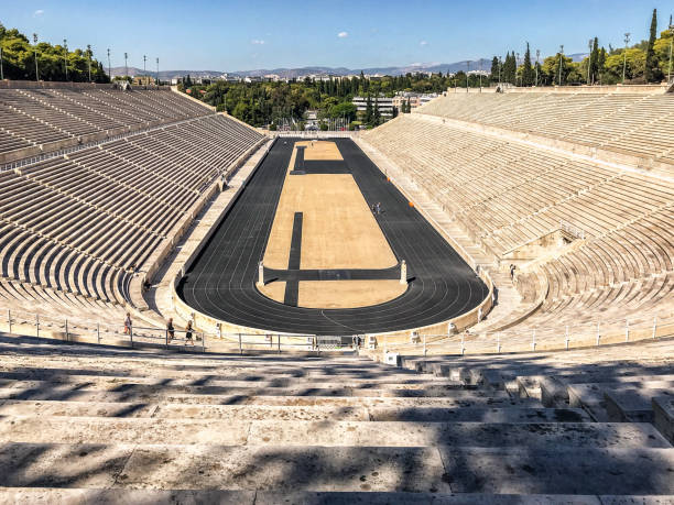 Athens, Greece - 09 October 2017:  Panathenaic Stadium, Kallimarmaro white marble antique stadium in Athens, Greece Athens, Greece - 09 October 2017:  Panathenaic Stadium or Kallimarmaro multi-purpose white marble antique stadium in Athens, Greece. Sports arena, ancient Greek architecture. olympic city stock pictures, royalty-free photos & images